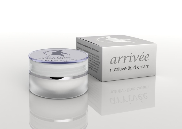 arrivee-nutritive-lipid-mit-packung Transparenter Cremetiegel der arrivée nutritive lipid cream mit silbernem Deckel und reflektierender Oberfläche